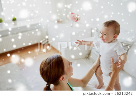 happy young mother with little baby at home happy young mother with little baby at home 36213242