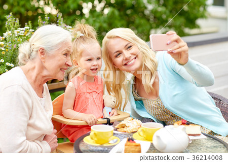happy family taking selfie at cafe happy family taking selfie at cafe 36214008