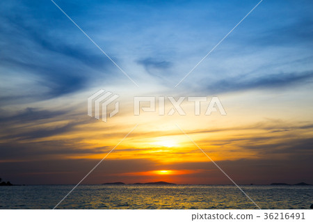 Sky and sunset behind the mountains at sea. Sky and sunset behind the mountains at sea. 36216491