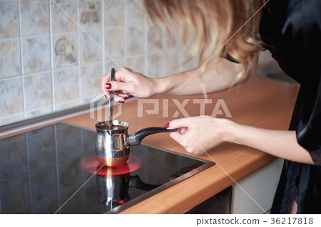 Cooking coffee in traditional copper turkey on a 36217818