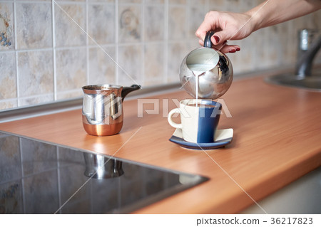 Cooking coffee in traditional copper turkey on a 36217823