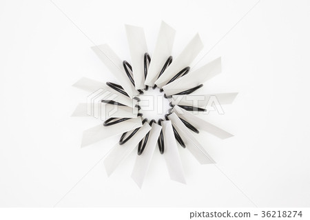Propeller of white  envelopes on the white table 36218274