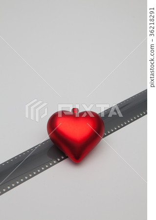 The red heart and the unrolled exposed 35mm film 36218291