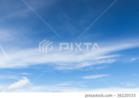 White fluffy clouds in the blue sky White fluffy clouds in the blue sky 36220533