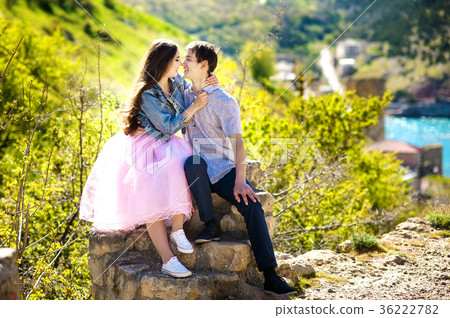 a beautiful young woman and her boyfriend are on 36222782