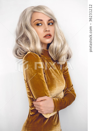 Beautiful blonde in velvet dress Beautiful blonde in velvet dress 36231212