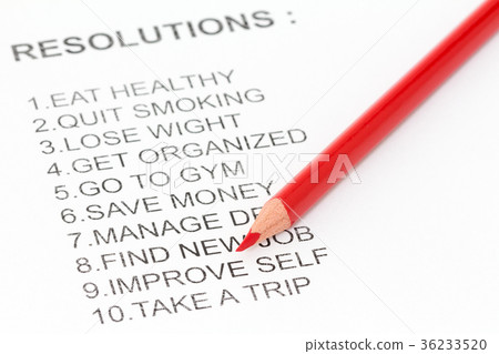 Red pencil and list of resolutions 36233520