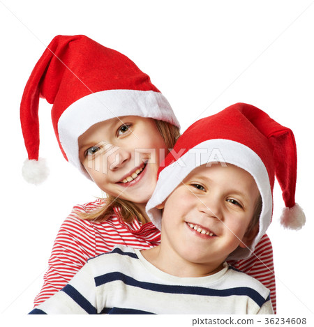 Girl and little boy in Santa Claus hat 36234608