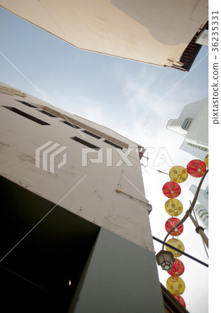 Low angle view of some low rise buildings. 36235331