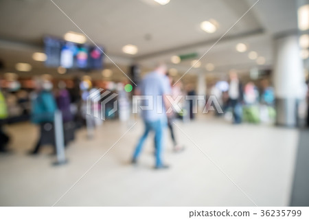 Blurred people walking in Edinburgh Airport 36235799