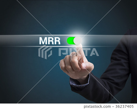 Businessman hand pressing button MRR. Businessman hand pressing button MRR. 36237405