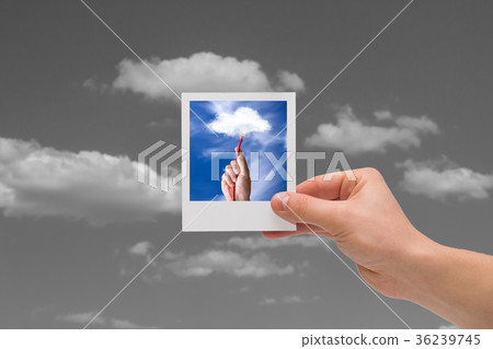 Holding Instant photo. Cloud computing concepts. Holding Instant photo. Cloud computing concepts. 36239745