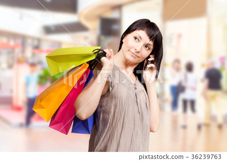 Girl with shopping bags 36239763