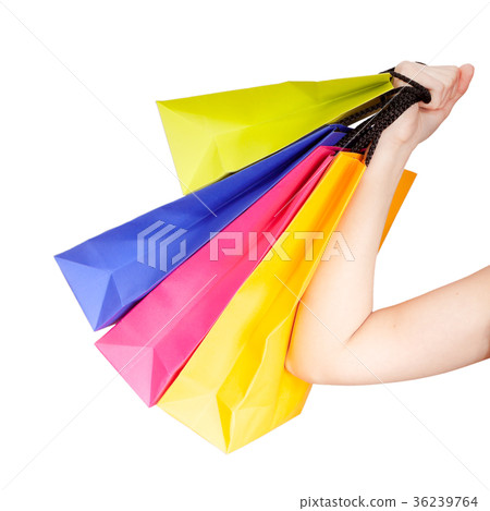 hand holding shopping bags 36239764