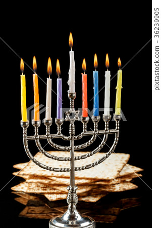 Menorah with candles for Hanukkah on black table Menorah with candles for Hanukkah on black table 36239905