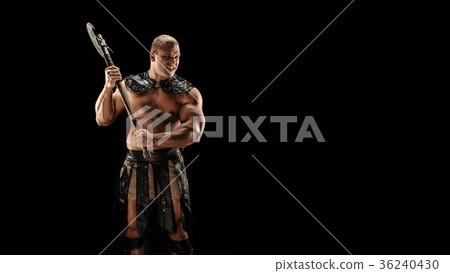 Severe barbarian in leather costume with hammer Severe barbarian in leather costume with hammer 36240430