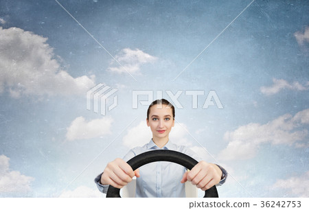 Woman with steering wheel Woman with steering wheel 36242753