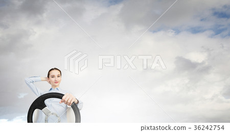 Woman with steering wheel Woman with steering wheel 36242754