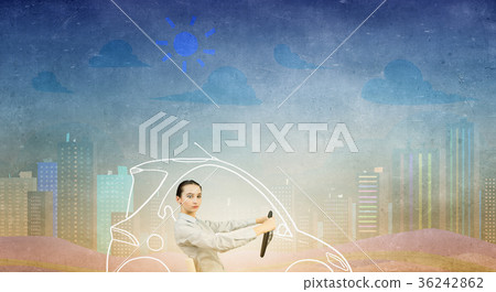 Woman with steering wheel 36242862