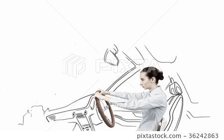 Woman with steering wheel 36242863