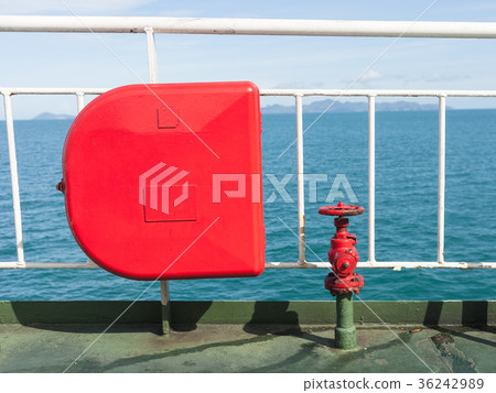 Fire extinguisher with pipe connector on a ferry. 36242989