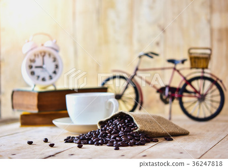 Roasted coffee beans in a small canvas bag Roasted coffee beans in a small canvas bag 36247818