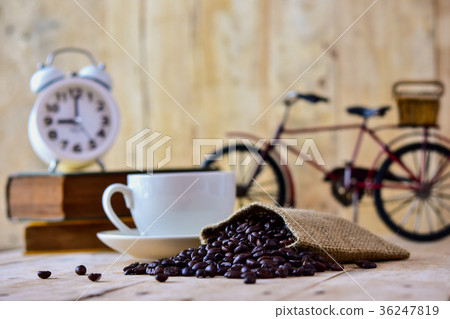 Roasted coffee beans in a small canvas bag Roasted coffee beans in a small canvas bag 36247819