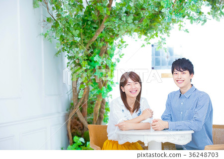 Happy young couple young men and women college students 36248703