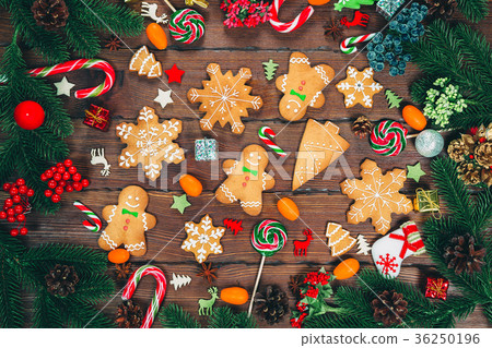 Christmas gingerbread cookies homemade on wooden Christmas gingerbread cookies homemade on wooden 36250196