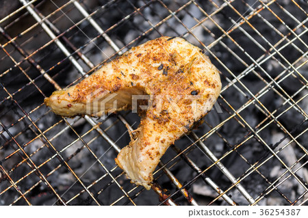 Cooking fish. Barbecue. Fish steak. BBQ with fish. 36254387