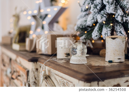 Magical Christmas snow globe with little angel 36254508