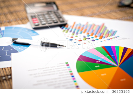 Financial paper charts and graphs on the table Financial paper charts and graphs on the table 36255165