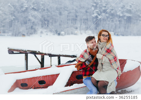 Emotional portrait of the happy couple wrapped in Emotional portrait of the happy couple wrapped in 36255185