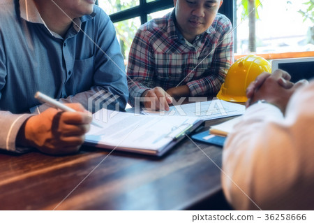 Business people meet to talk about investing Business people meet to talk about investing 36258666