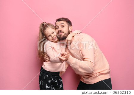 Young father with his baby daughter Young father with his baby daughter 36262310