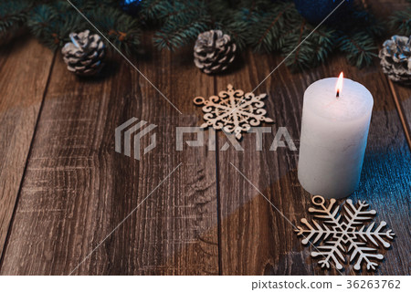christmas candle on a wooden background christmas candle on a wooden background 36263762