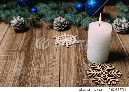 christmas candle on a wooden background 36263764