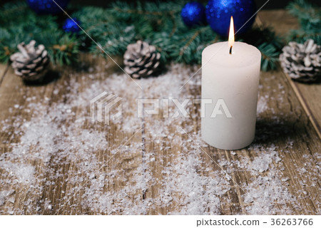 christmas candle on a wooden background 36263766