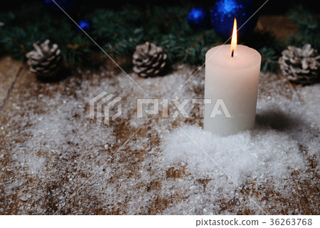 christmas candle on a wooden background christmas candle on a wooden background 36263768