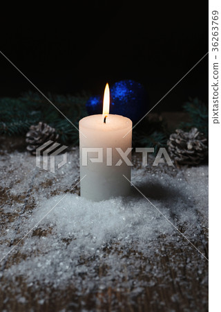 christmas candle on a wooden background 36263769