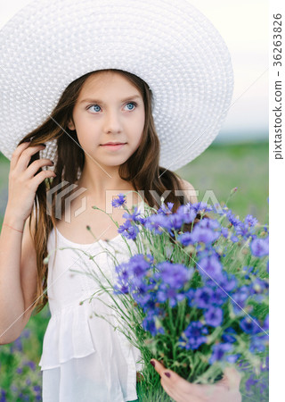 Girl with a bouquet of lavender Girl with a bouquet of lavender 36263826