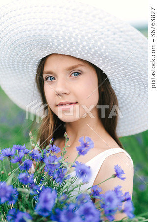 Girl with a bouquet of lavender Girl with a bouquet of lavender 36263827