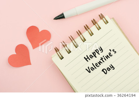 Happy valentines day text written on notebook 36264194