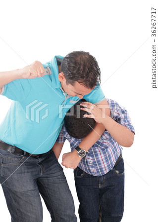 Young kid about to be thumped by father 36267717