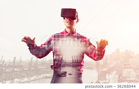 Guy wearing checked shirt and virtual mask stretching hands and 36268044