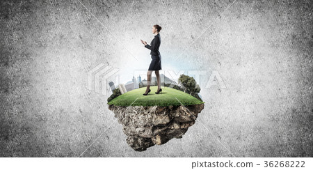 Confident lady boss and modern city as concept of eco green cons Confident lady boss and modern city as concept of eco green cons 36268222