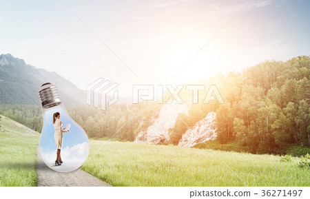 Businesswoman inside light bulb 36271497