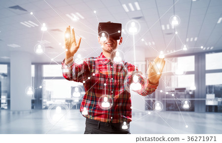 Guy wearing checked shirt and virtual mask reaching hand to touch screen Guy wearing checked shirt and virtual mask reaching hand to touch screen 36271971