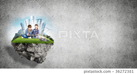 Two kids of school age with book exploring this great world Two kids of school age with book exploring this great world 36272381