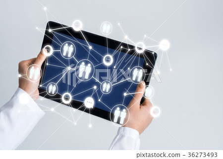 Close of female doctor hands working with tablet pc computer 36273493
